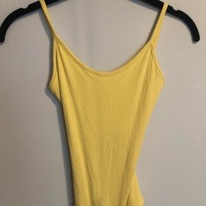 Yellow open back body suit. Brand new!